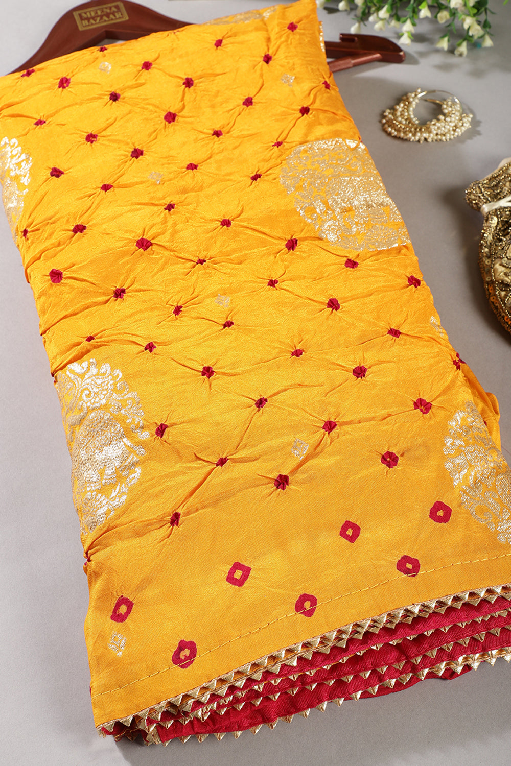 Mustard Color Bandhej Modal Silk Zari Woven Saree