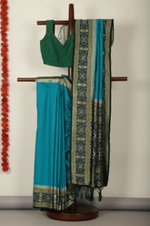 Turquoise  & Green Dual Toned Tussar Silk Patola Woven Saree