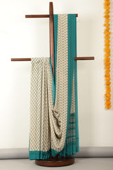 Beige & Teal Crepe Printed Saree