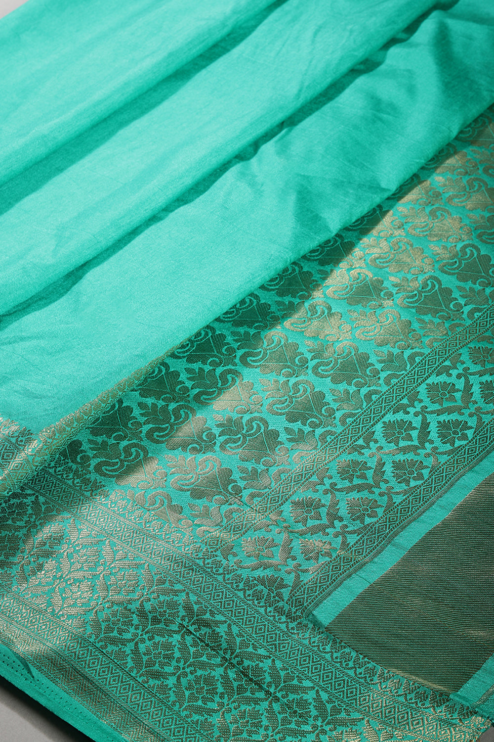 Greenish Teal Colour Silk Woven Saree