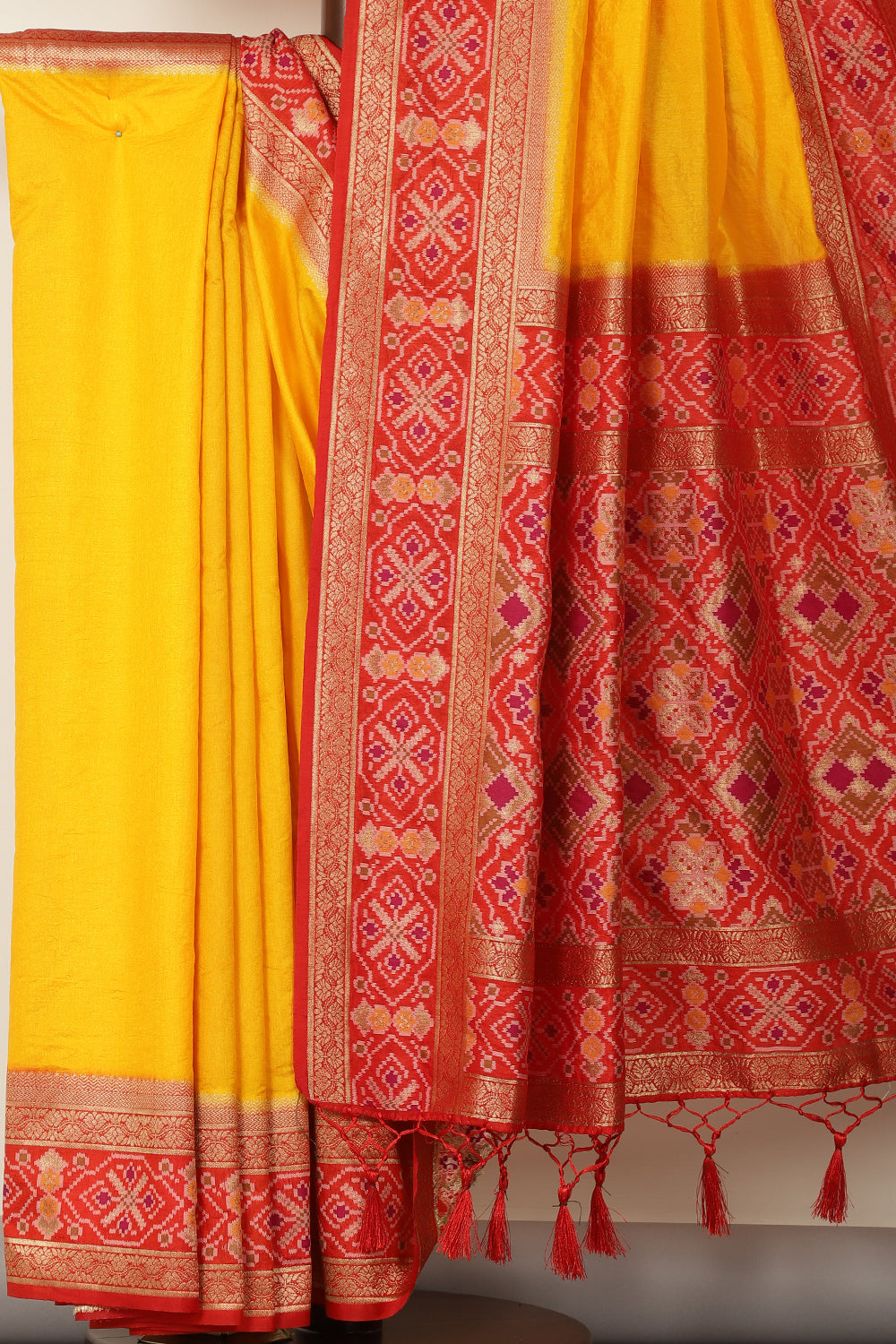 Yellow & Red Dual Toned Tussar Silk Patola Woven Saree