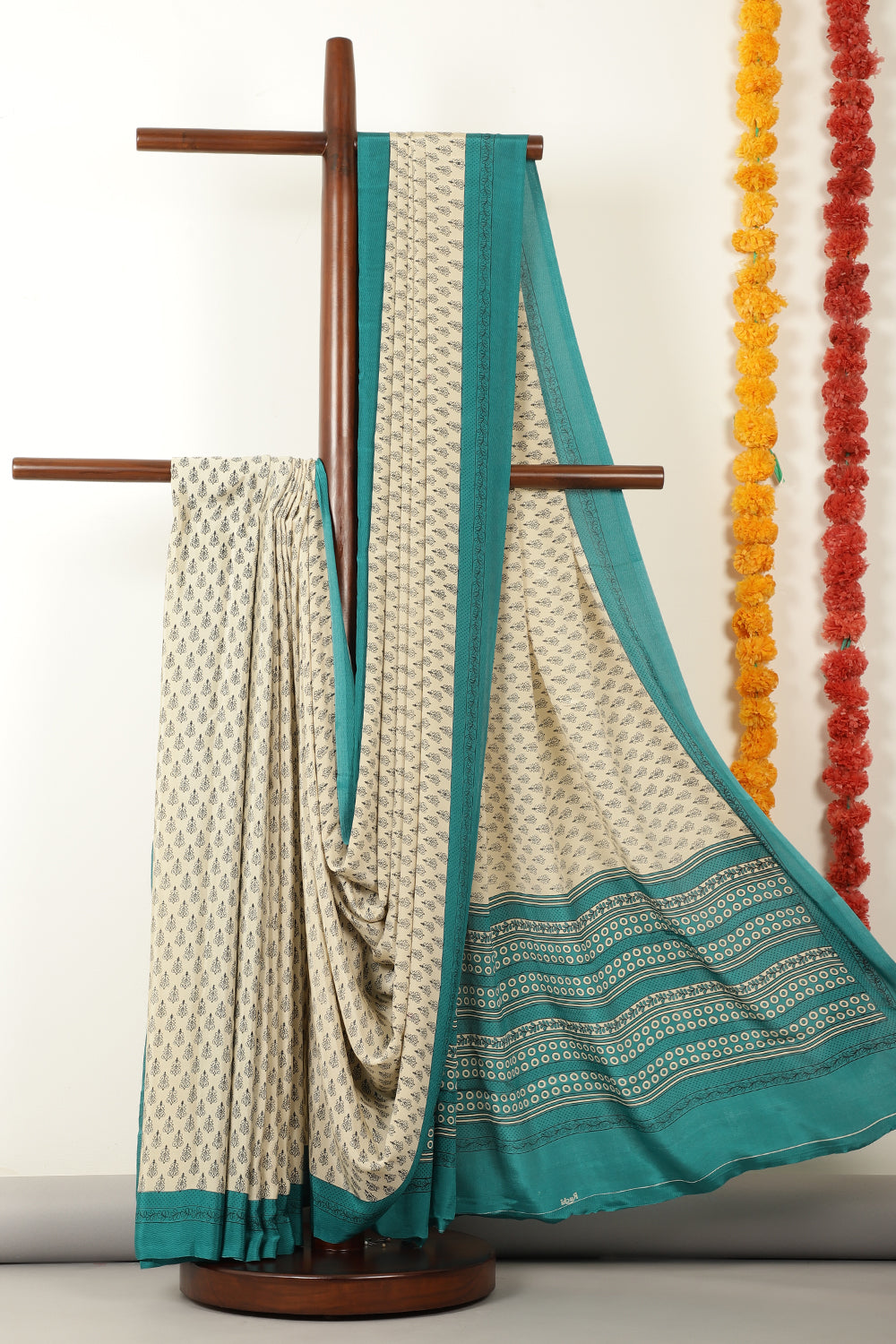Beige & Teal Crepe Printed Saree