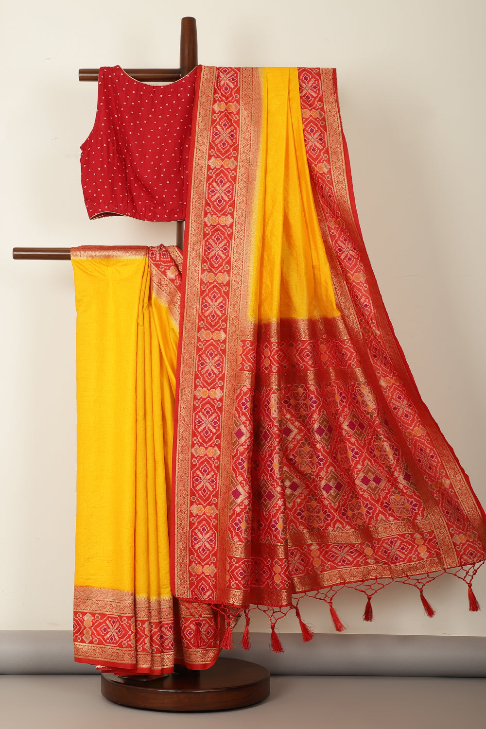 Yellow & Red Dual Toned Tussar Silk Patola Woven Saree