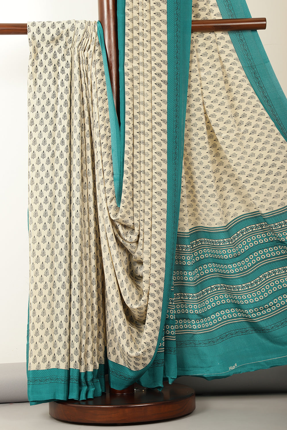 Beige & Teal Crepe Printed Saree