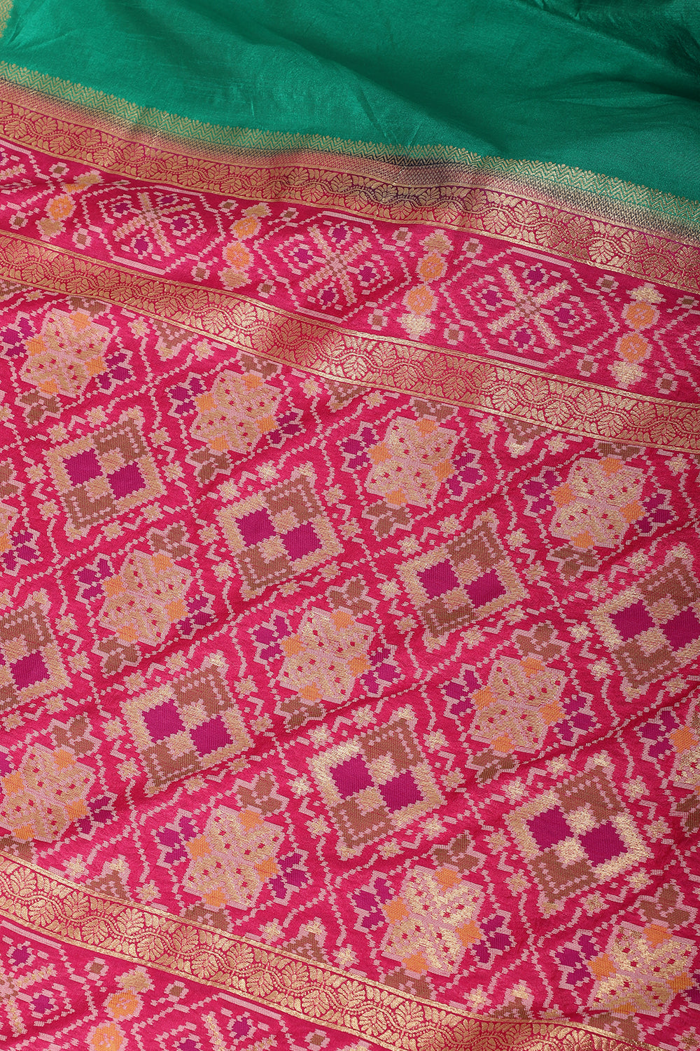Teal & Magenta Dual Toned Tussar Silk Patola Woven Saree