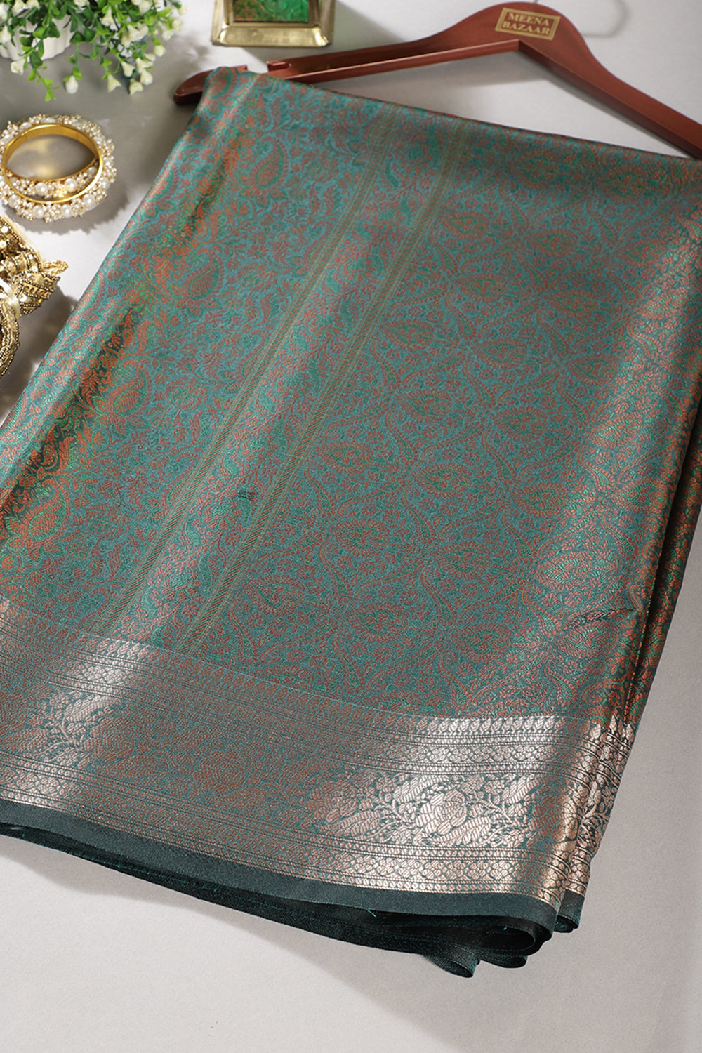 Teal Green Silk Floral and Paisley Resham & Zari Woven Saree