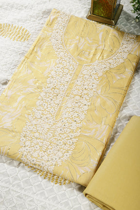 Pale Yellow Colour Cotton Printed & Resham Neck Embroidered Unstitched Suit
