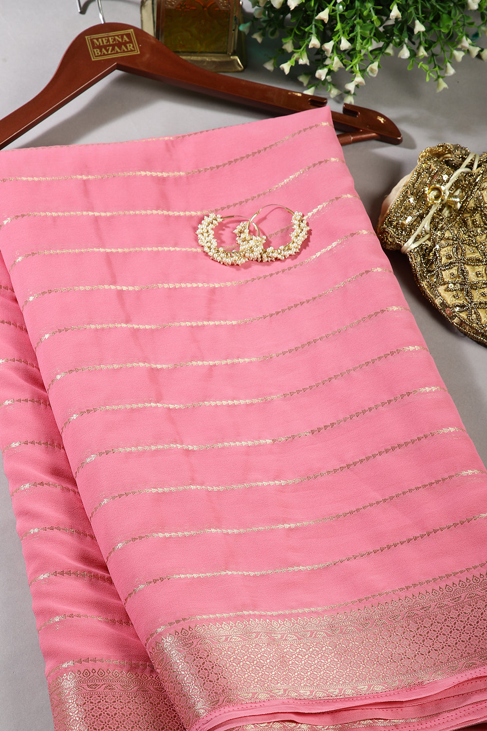 Pink Color Georgette Saree with Zari Pinstripes