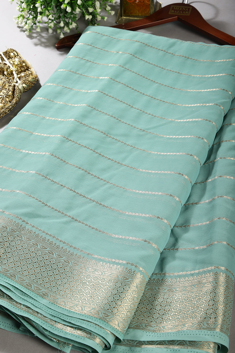 Turquoise Color Georgette Saree with Zari Pinstripes