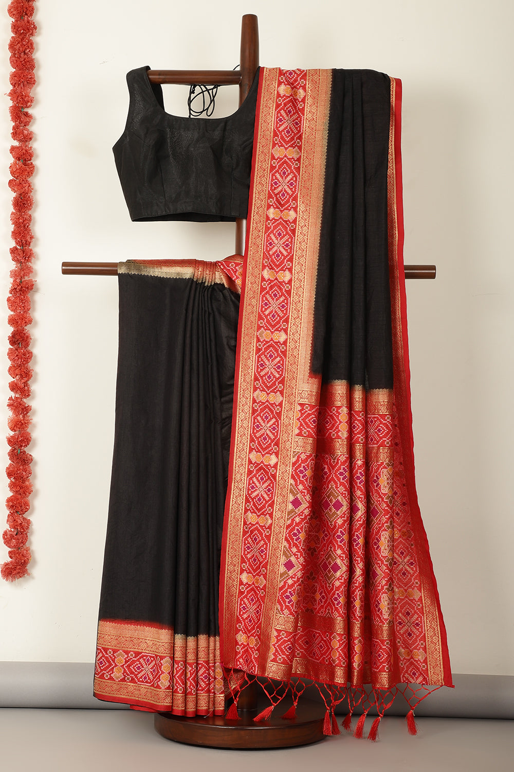 Black & Green Dual Toned Tussar Silk Patola Woven Saree