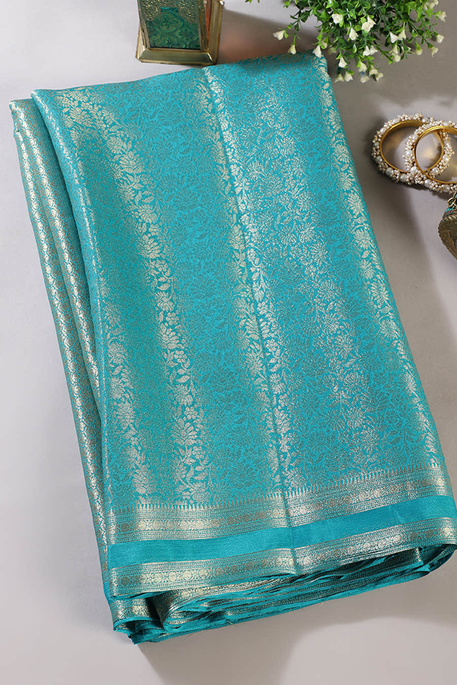 Teal Floral Zaal Zari Woven Crepe Silk Saree