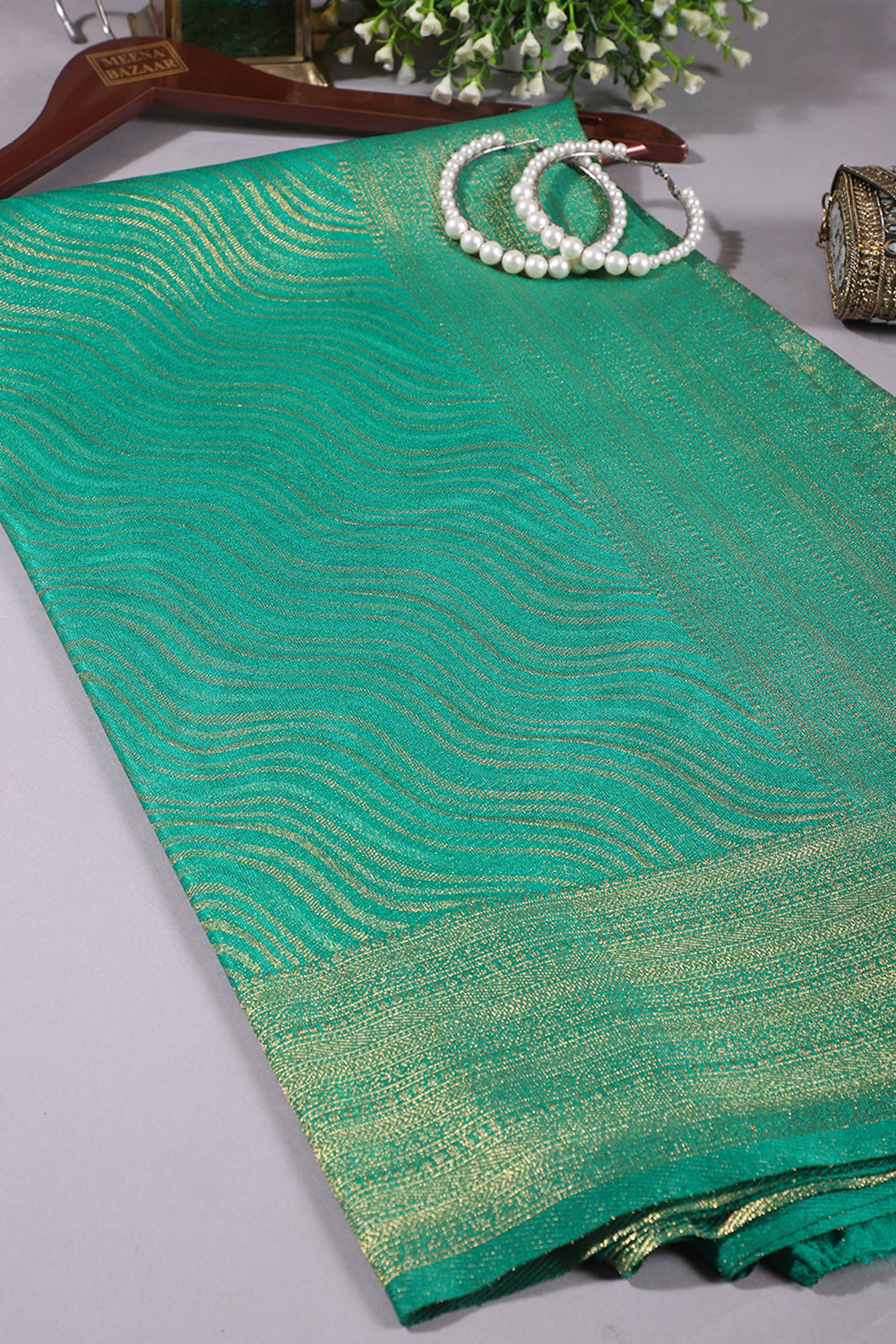 Teal Green Color Soft Silk Leheria Zari Woven Saree