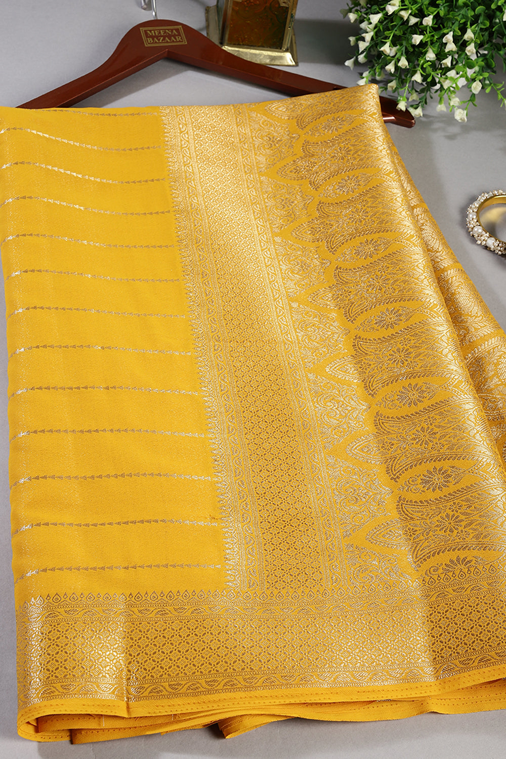 Yellow Color Georgette Saree with Zari Pinstripes