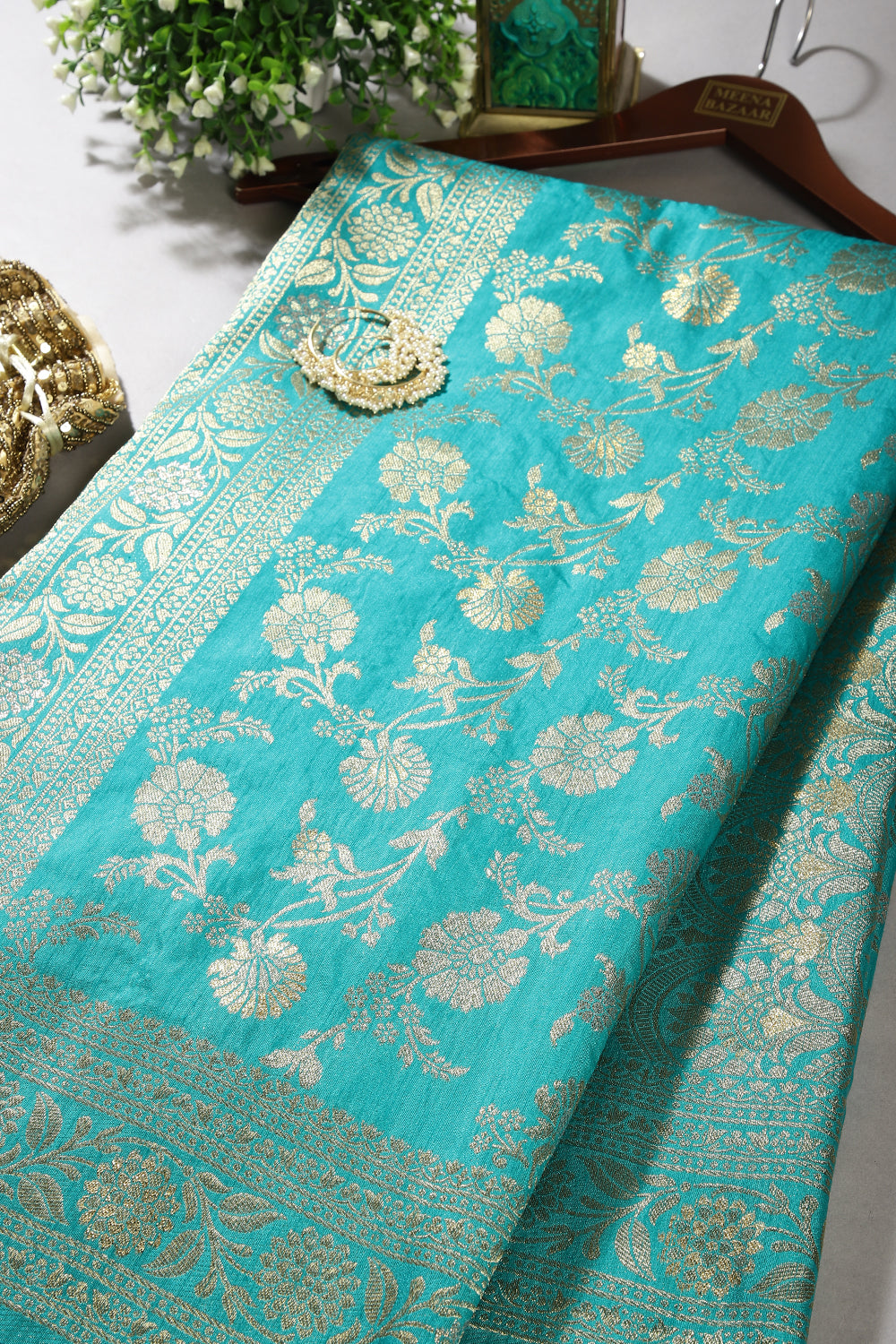 Turquoise Color Raw Silk Woven Saree