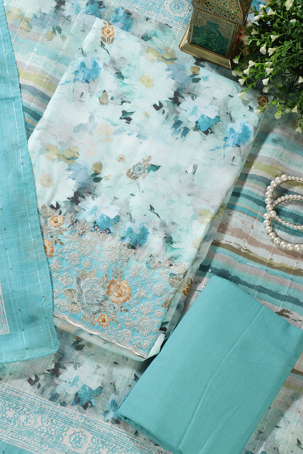 Turquoise Cotton Floral Printed And Hemline Embroidered Unstitched Suit