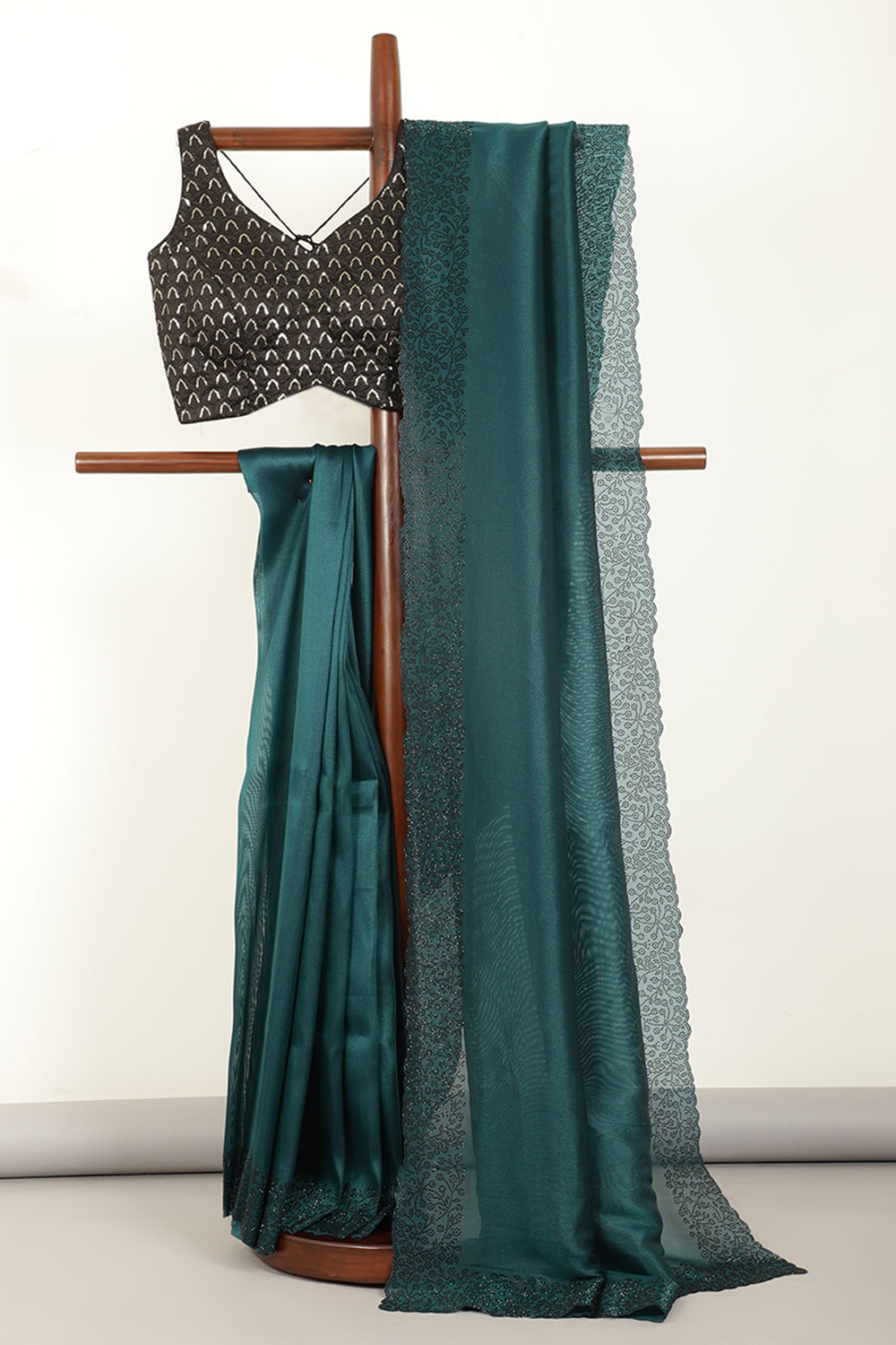 Bottle Green Color Tissue Silk Saree with Swarovski Border