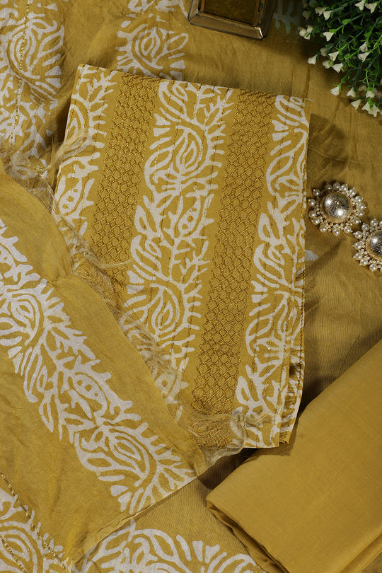 Mustard Cotton Printed And Resham Embroidered Unstitched Suit Material