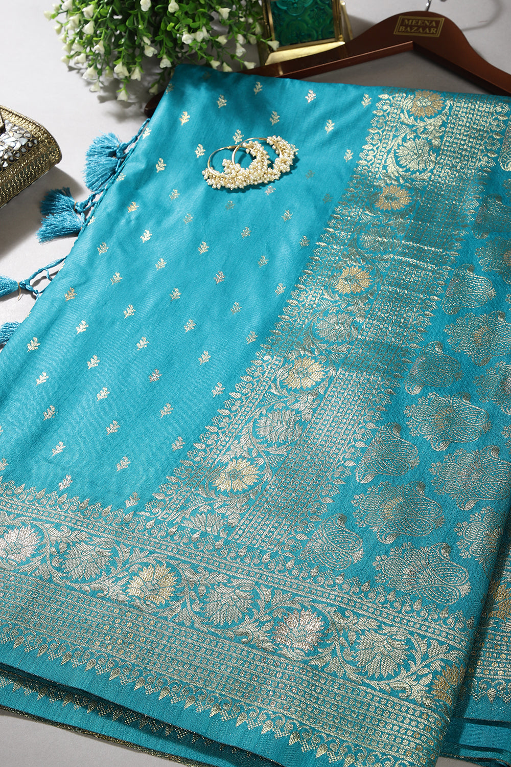 Turquoise Color Raw Silk Woven Saree