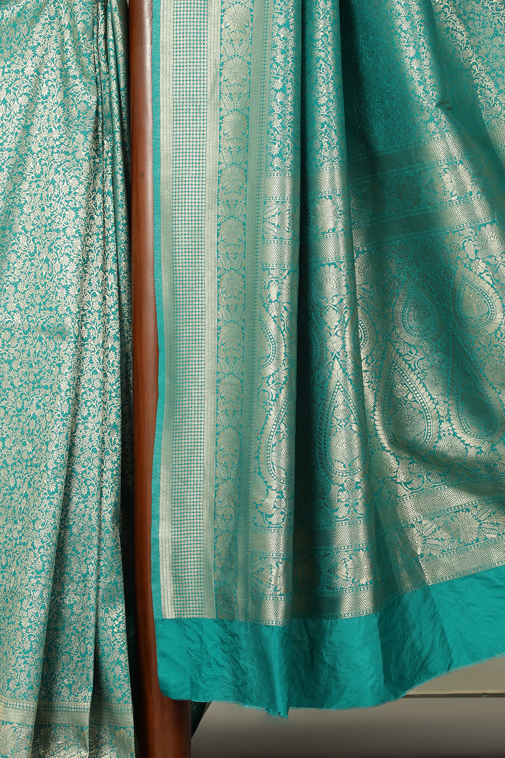 Teal Silk Zari Floral Zaal Woven Saree