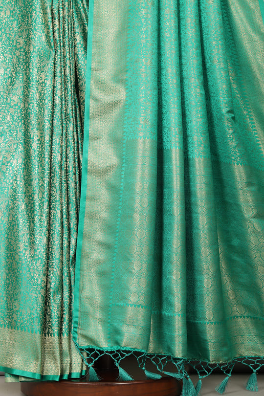 Teal Green Zari Woven Soft Silk Saree