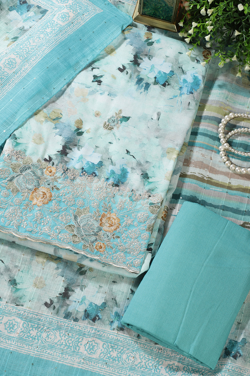 Turquoise Cotton Floral Printed And Hemline Embroidered Unstitched Suit