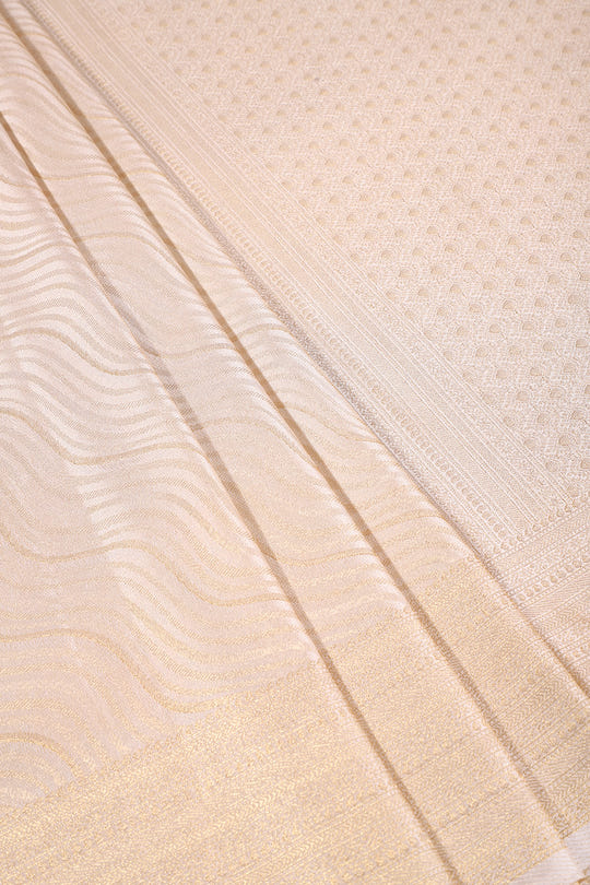 Cream Colour Soft Silk Leheria Zari Woven Saree