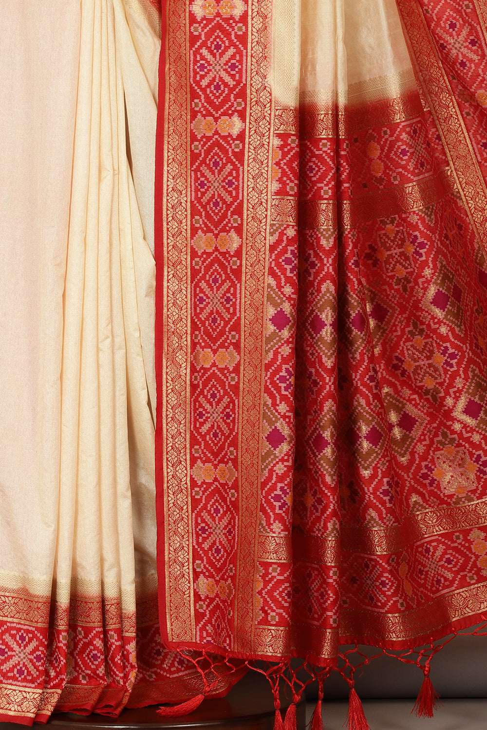 Cream & Red Dual Toned Tussar Silk Patola Woven Saree