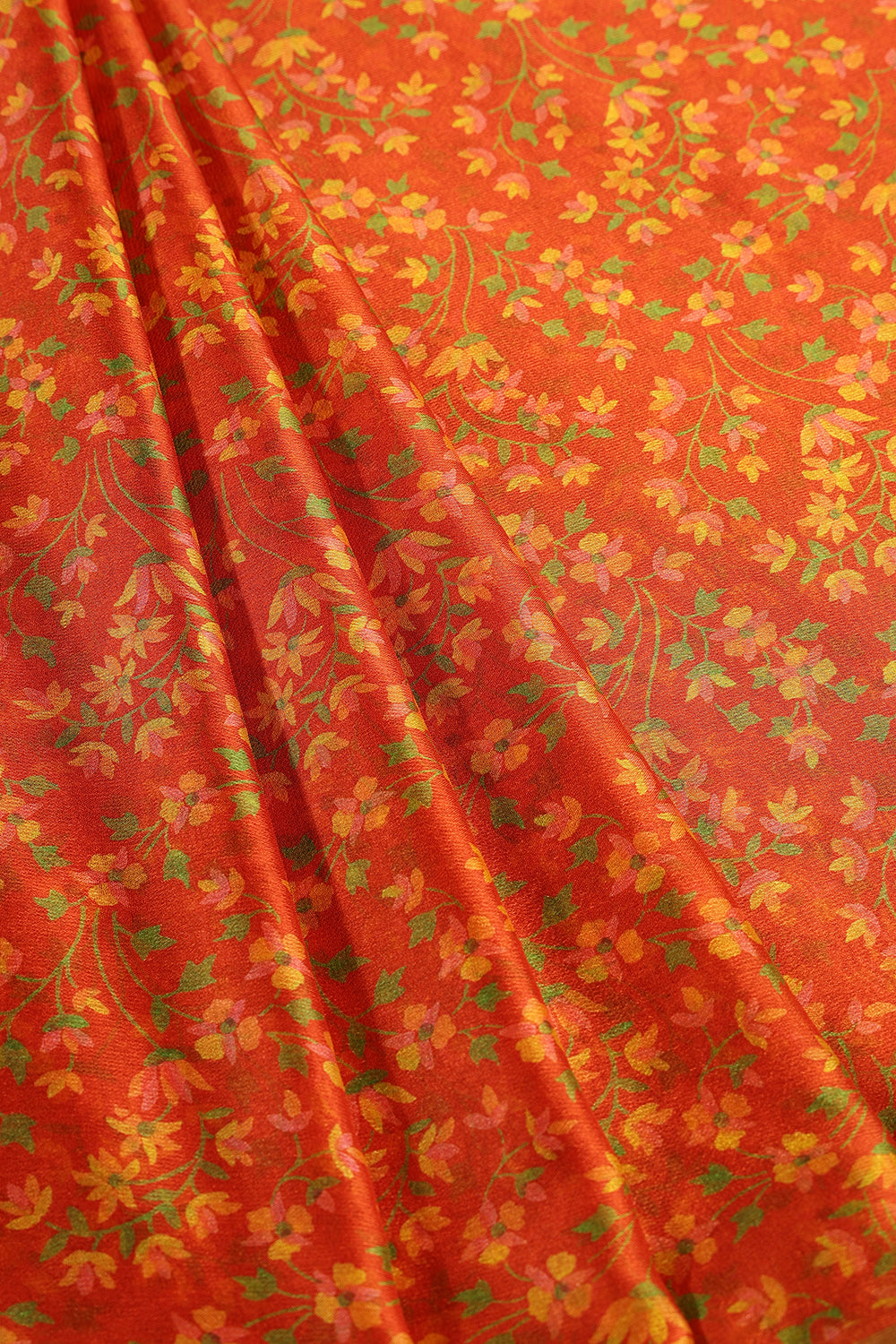 Orange Floral Printed And Zari Border Chiffon Saree