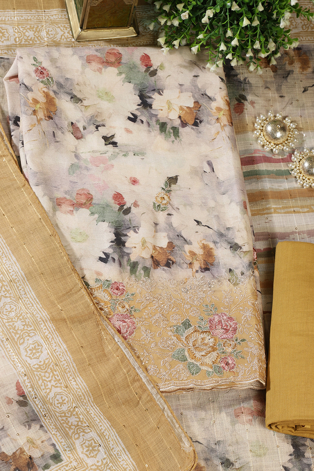 Mustard Cotton Floral Printed And Hemline Embroidered Unstitched Suit