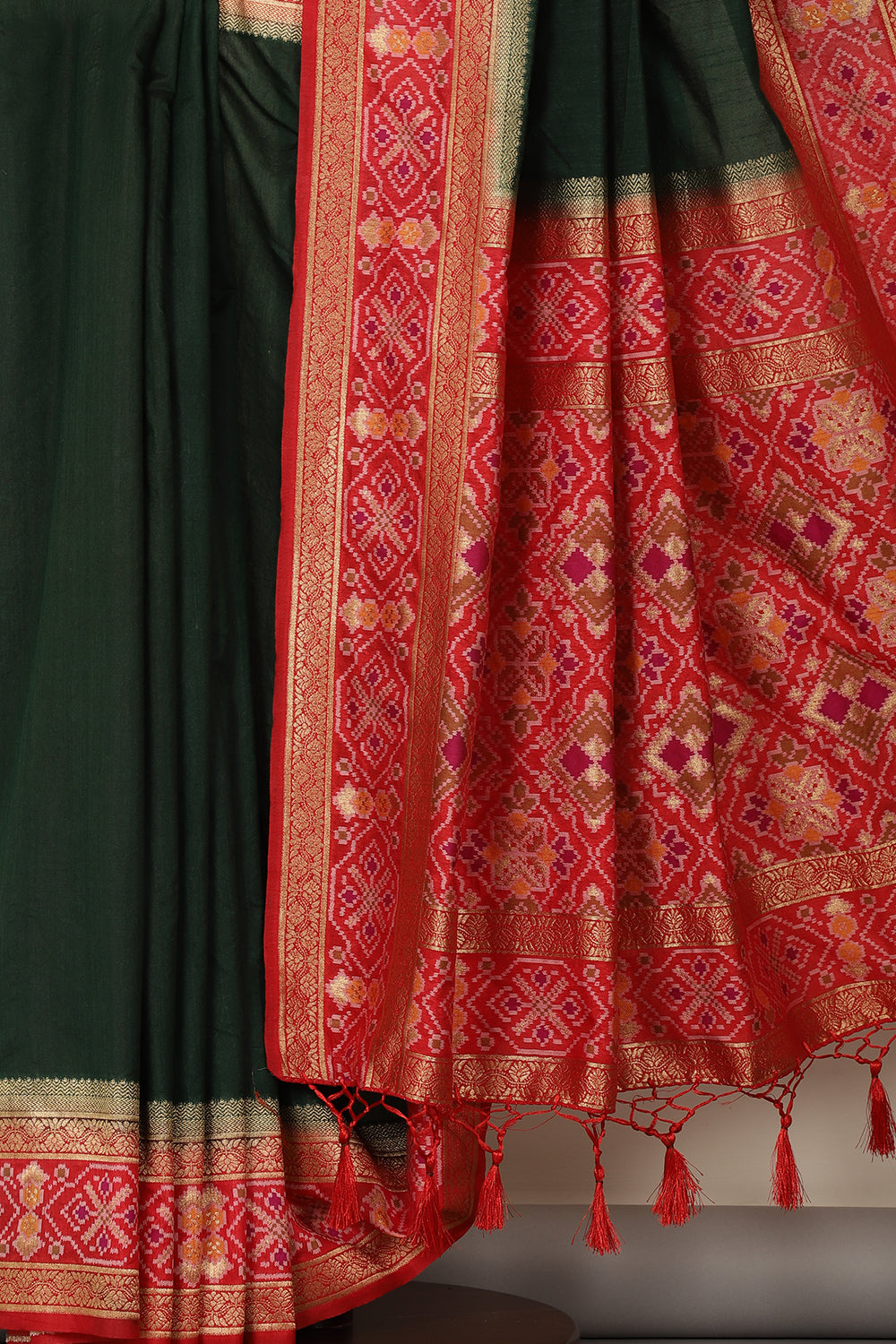 Bottle Green & Red Dual Toned Tussar Silk Patola Woven Saree