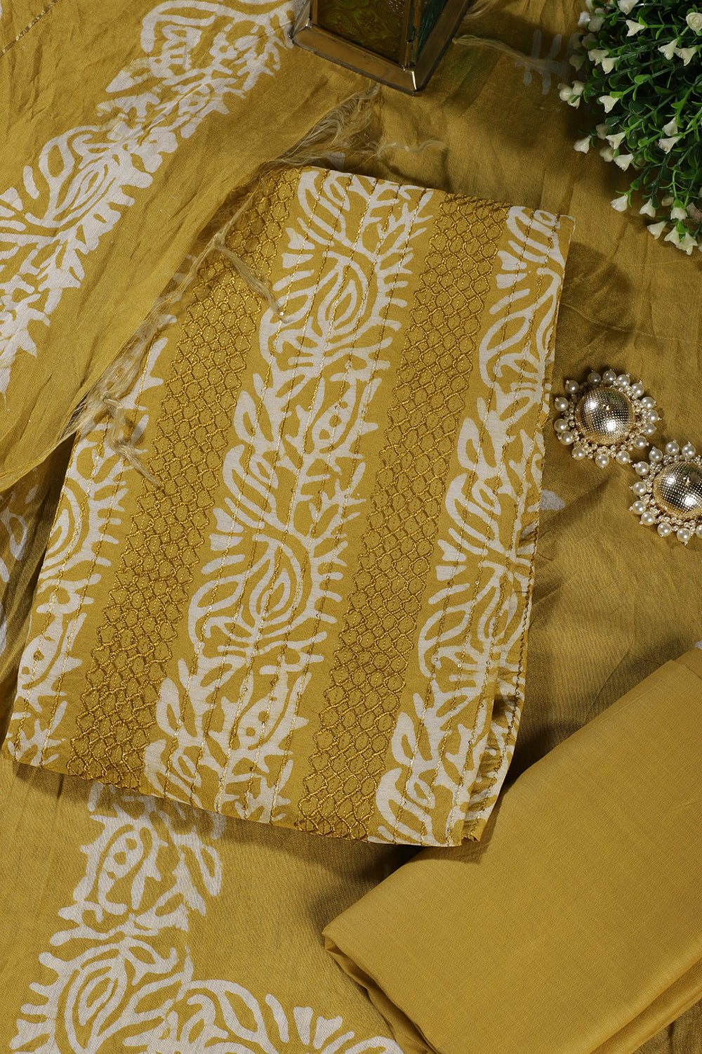 Mustard Cotton Printed And Resham Embroidered Unstitched Suit Material