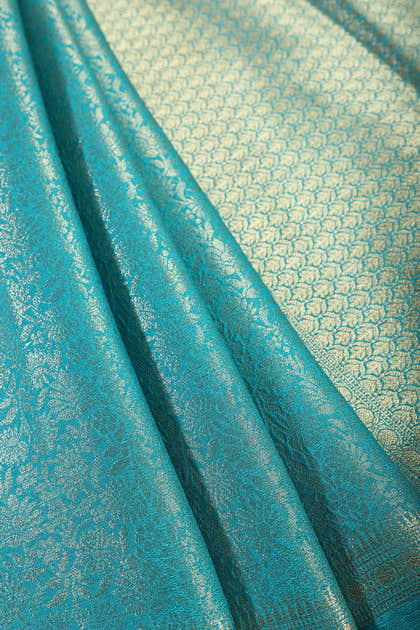Teal Floral Zaal Zari Woven Crepe Silk Saree