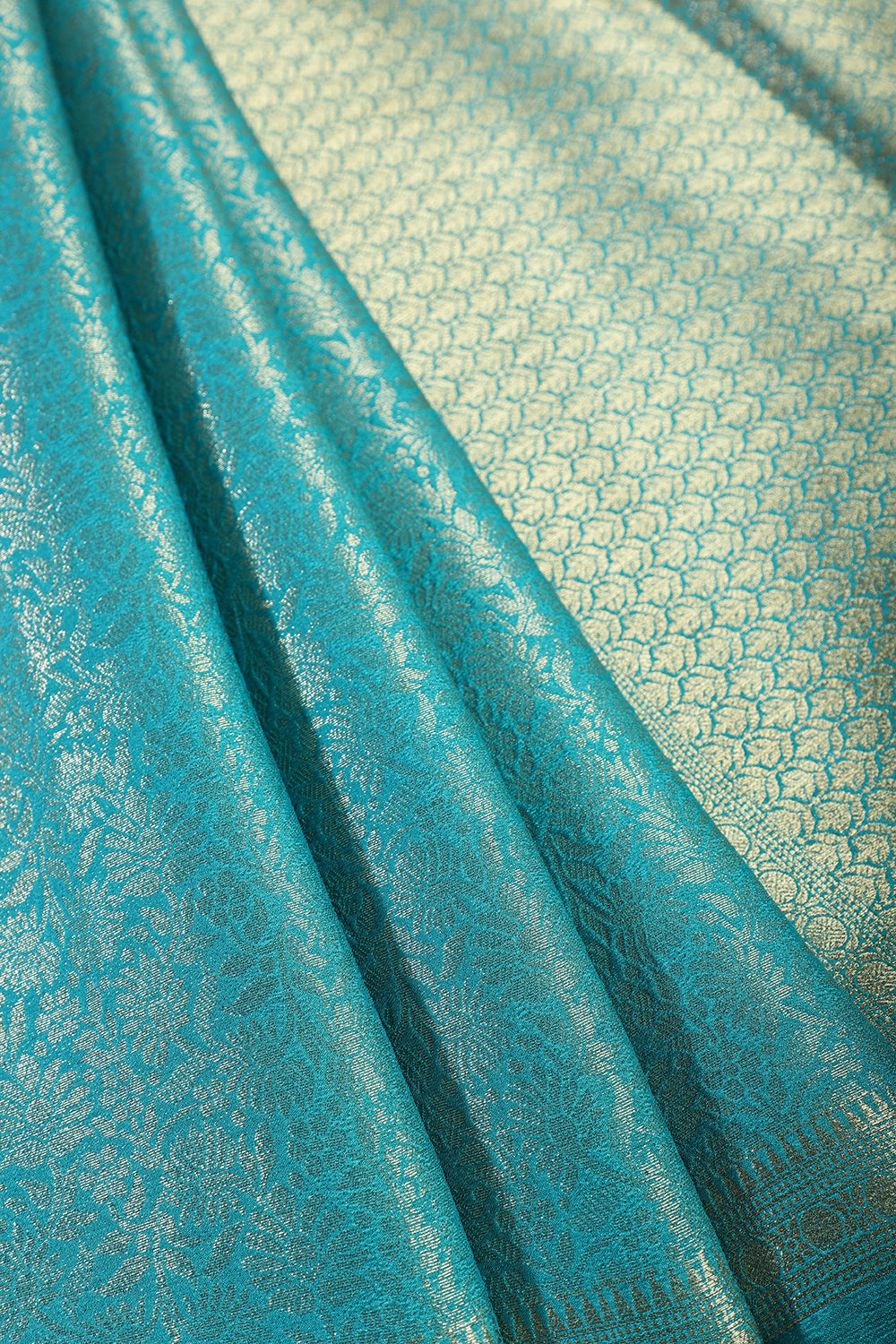 Teal Floral Zaal Zari Woven Crepe Silk Saree