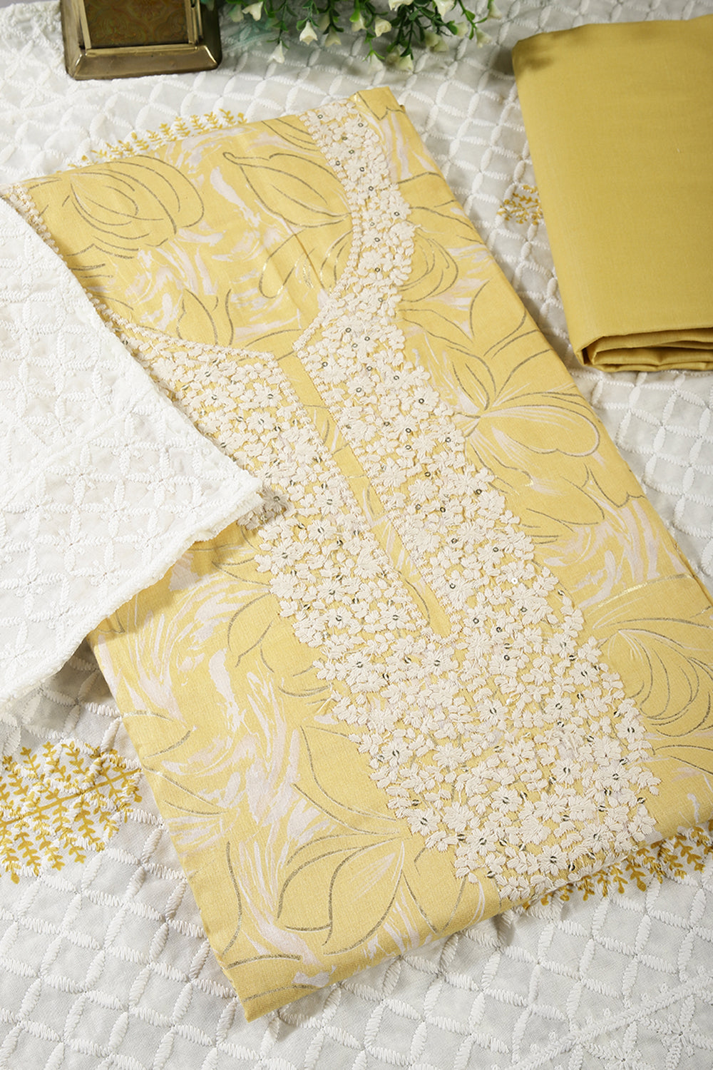 Pale Yellow Colour Cotton Printed & Resham Neck Embroidered Unstitched Suit