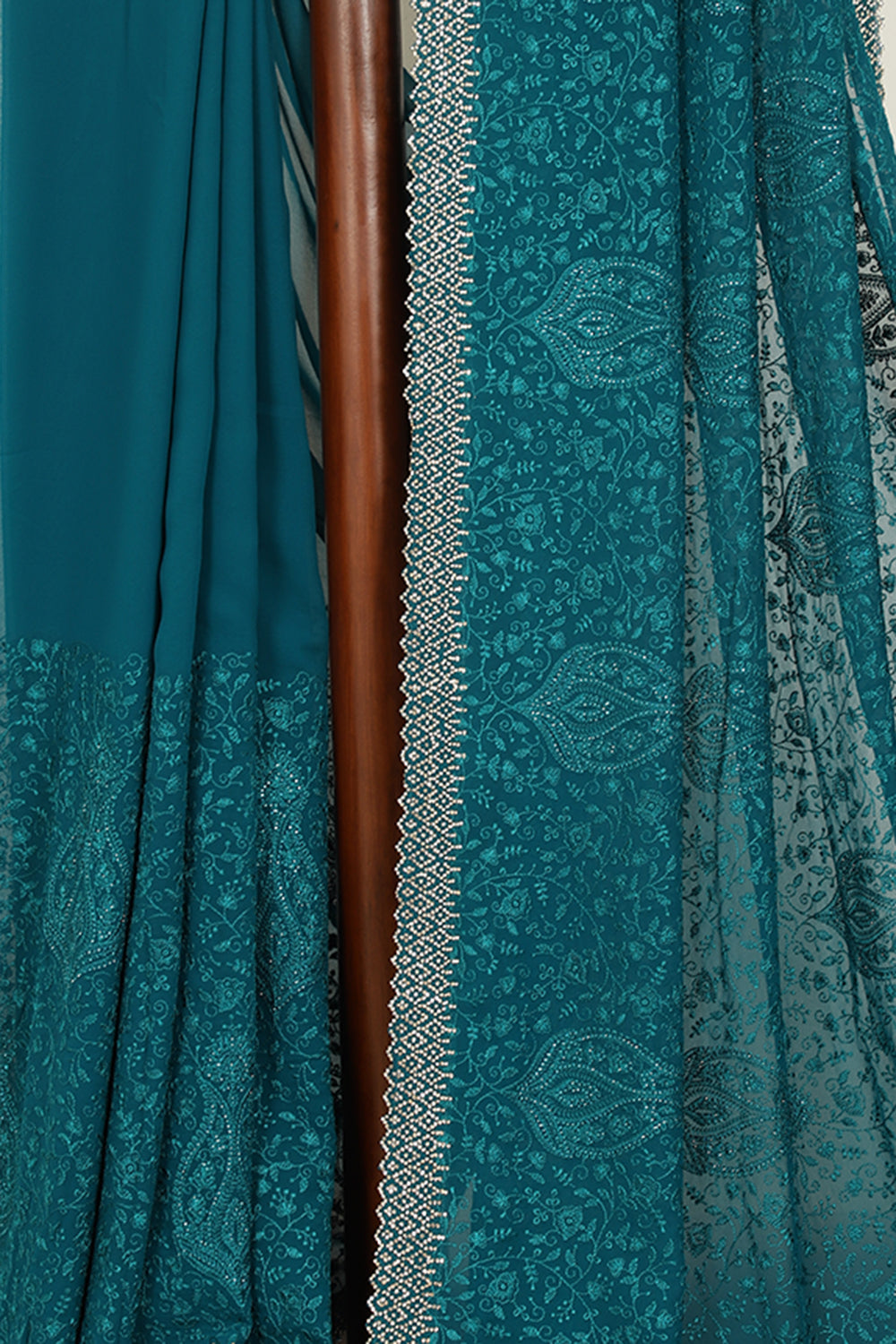 Teal Green Color Georgette Resham Floral Jal Woven And Swarovski Work Saree