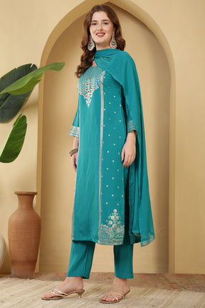 Turquoise Color Cotton Silk Printed & Neck Embroidered Suit