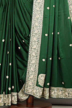 Bottle Green Color Pure Satin Crepe Saree with Zardozi Handwork & Paisley Buta
