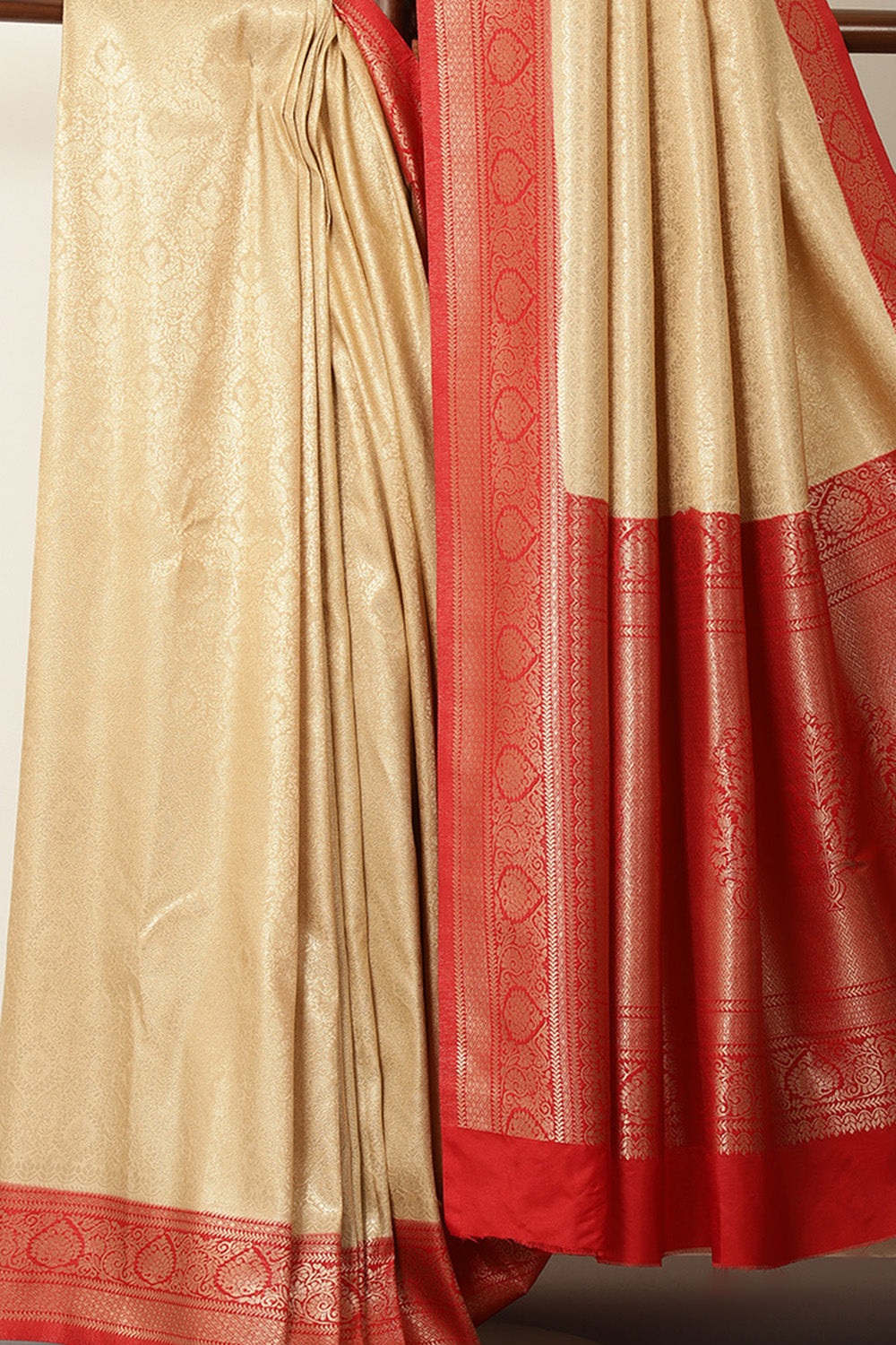 Beige & Red Dual Toned Soft Silk Zari Woven Saree