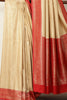 Beige & Red Dual Toned Soft Silk Zari Woven Saree