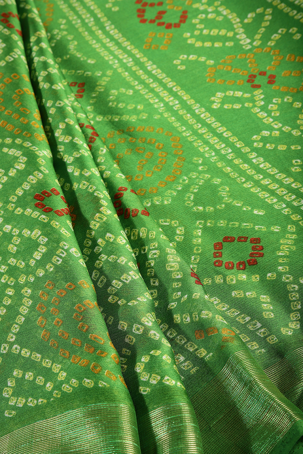 Muted Green Color Chiffon Bandhani Printed Saree