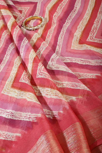 Coral Pink Chiffon Lehariya Printed Saree