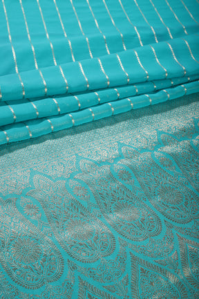Firozi Color Georgette Saree with Zari Pinstripes