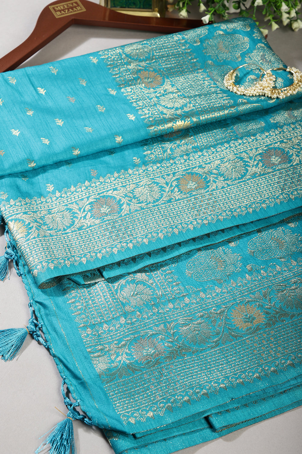 Turquoise Color Raw Silk Woven Saree