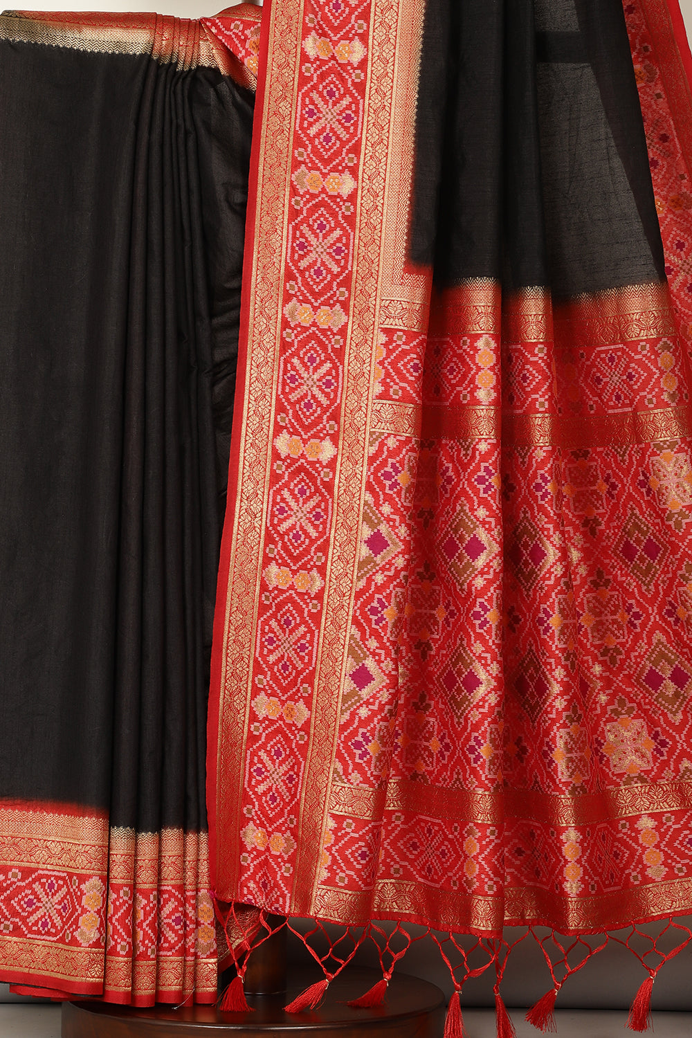 Black & Green Dual Toned Tussar Silk Patola Woven Saree