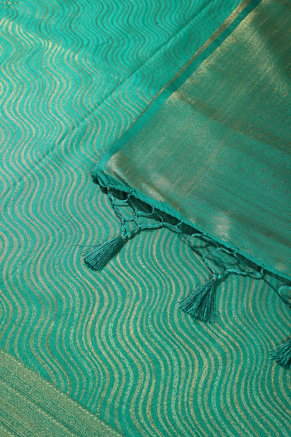Teal Green Color Soft Silk Leheria Zari Woven Saree