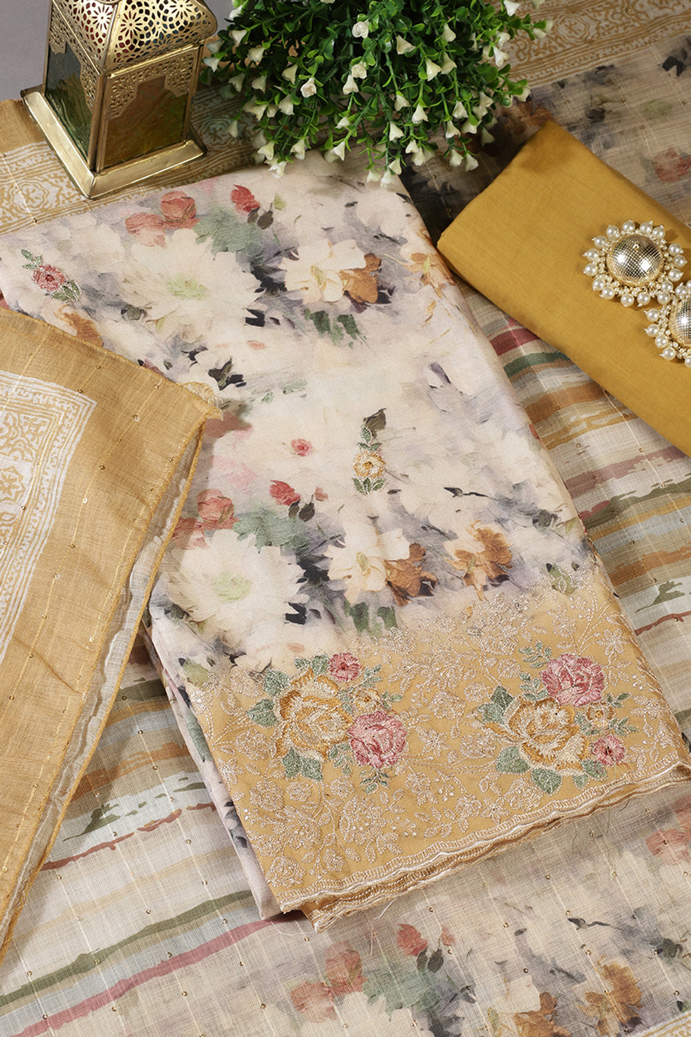 Mustard Cotton Floral Printed And Hemline Embroidered Unstitched Suit
