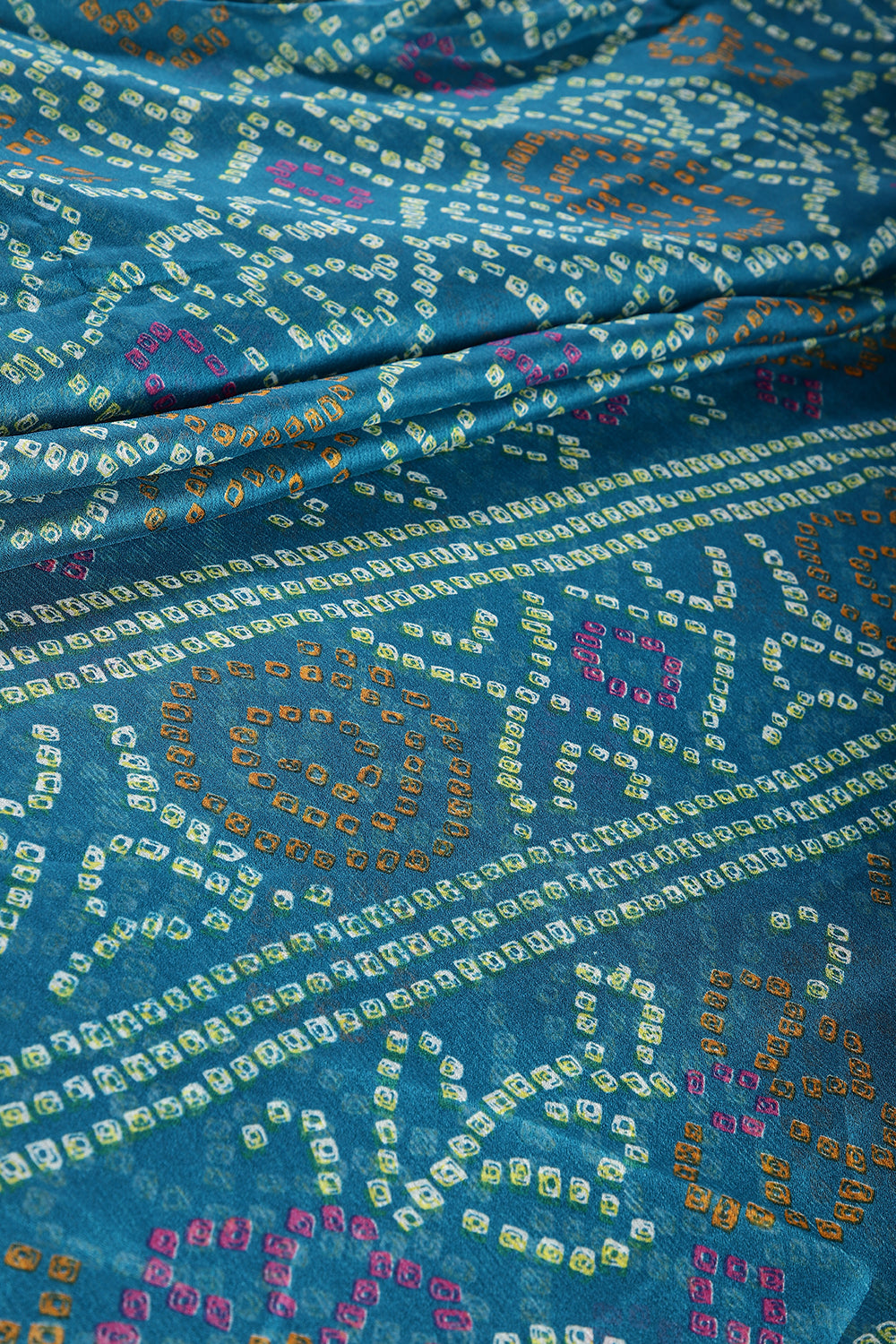 Muted Blue Color Chiffon Bandhani Printed Saree