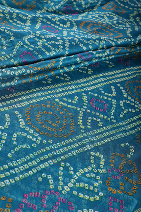 Muted Blue Color Chiffon Bandhani Printed Saree