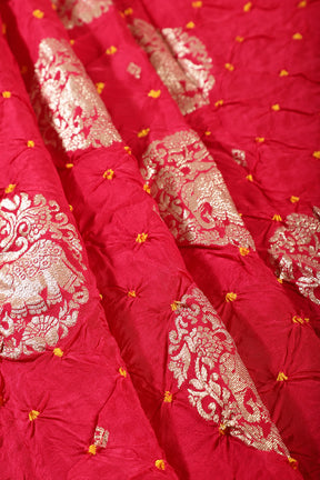 Fushia Pink Color Bandhej Modal Silk Zari Woven Saree