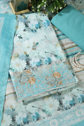 Turquoise Cotton Floral Printed And Hemline Embroidered Unstitched Suit